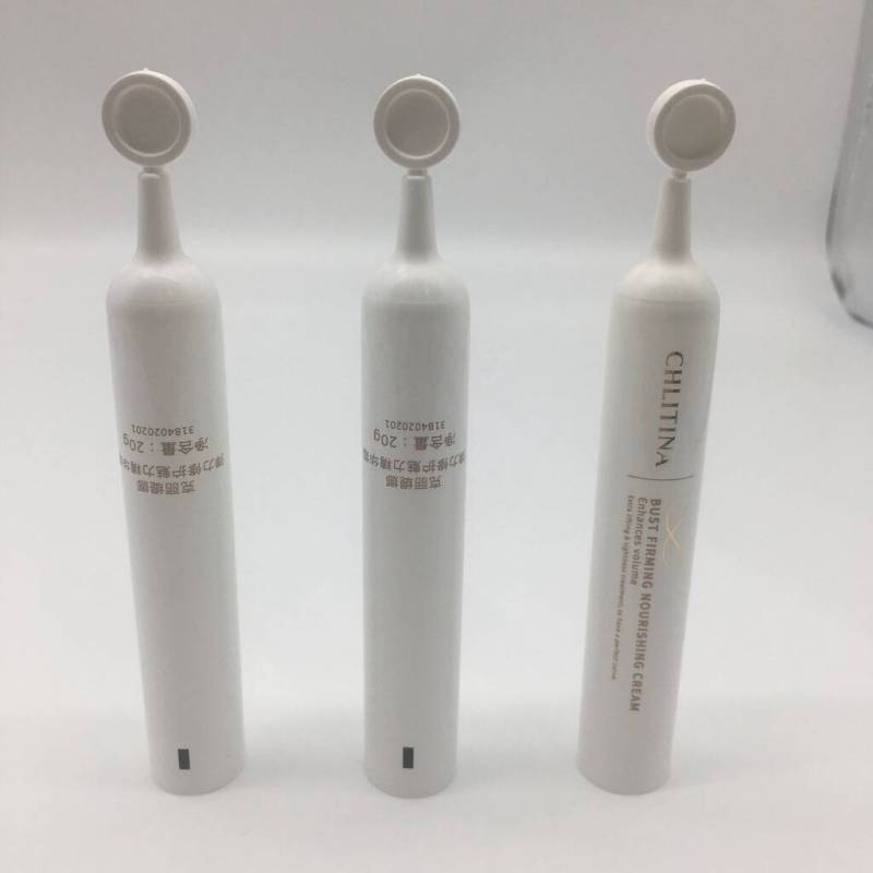 Twist off head for one-time use squeeze tube for cosmetic packaging
