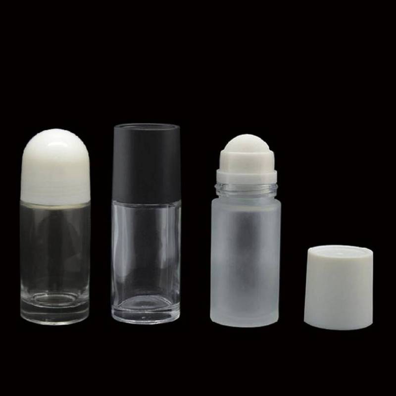 HOT SELL 50 ml fancy solid cosmetic deodorant roll on glass bottles for cosmetic packaging,empty glass roll on perfume bottle 