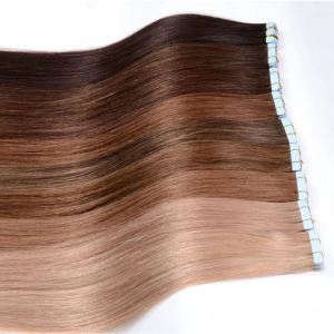 Human hair tape in hair extensions