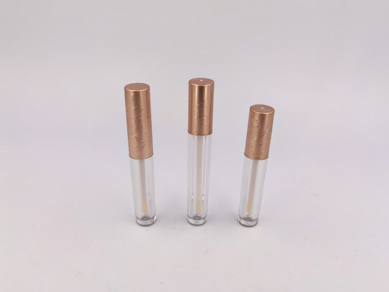 Cylinder empty lip gloss tube with wand brush rose gold embossed wire drawing new custom private label brush lip gloss tube