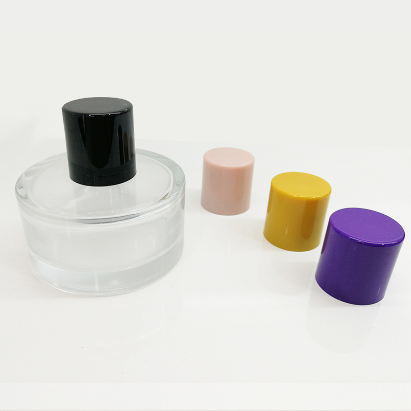 China Factory Hot Sale Eco Friendly ABS PP Plastic Perfume Cap with Add Weight 