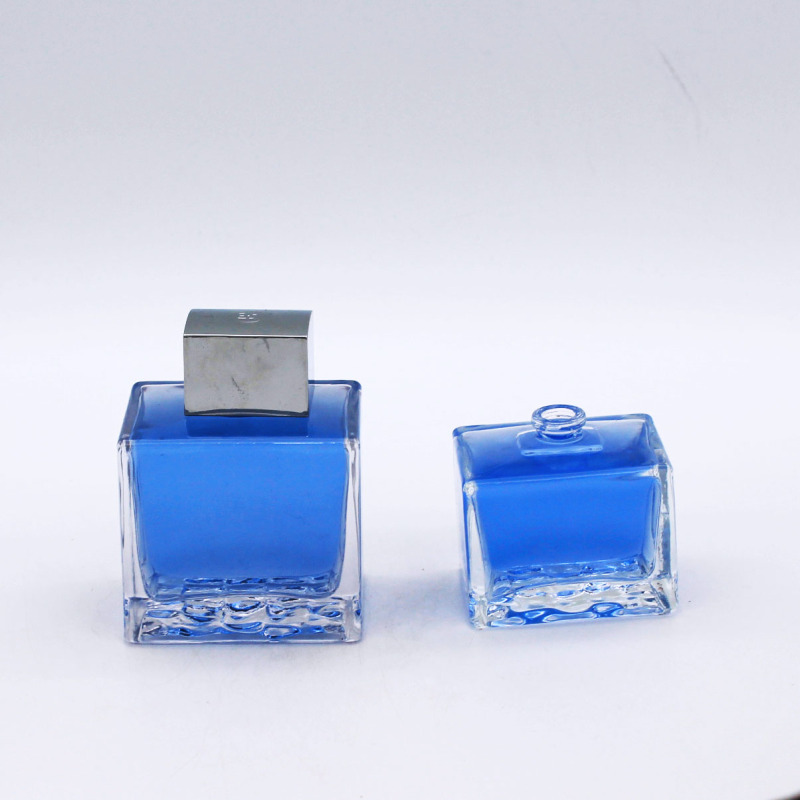 wholesale high-grade cosmetic 100ml transparent empty perfume glass bottle with cap