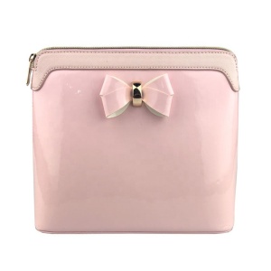 Daishu Wholesale Custom Logo Flat Toiletry Cosmetic Bag Ladies Pink PU Leather Makeup Pouch Bag With A Metal Bow Decoration 