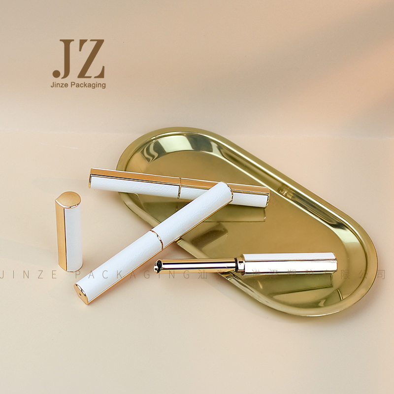Jinze long and thin drop shape lipstick tube gold color with white leather sticker lipstick container