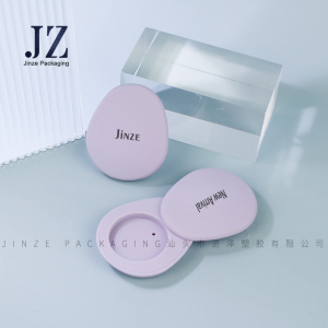 Jinze rubber finish stone shape single color eye shadow case rotating switch eye shadow container
