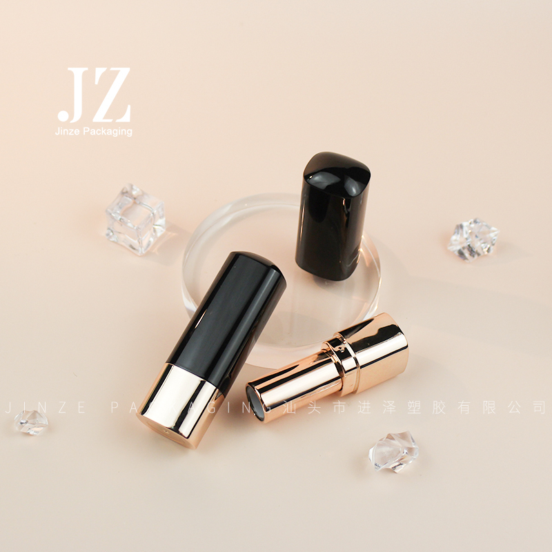 Jinze oval shape lipstick tube black lid with gold bottom lip balm container