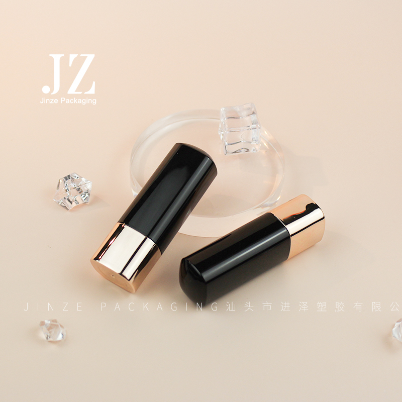Jinze oval shape lipstick tube black lid with gold bottom lip balm container