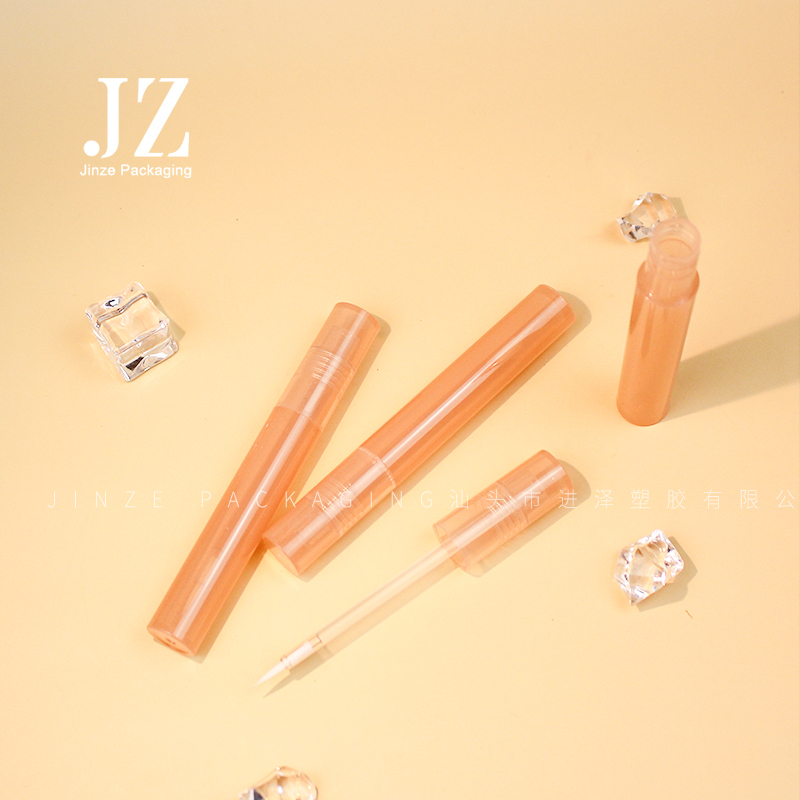 Jinze 4ml orange cream color full transparent eyeliner tube eye gel container with wand