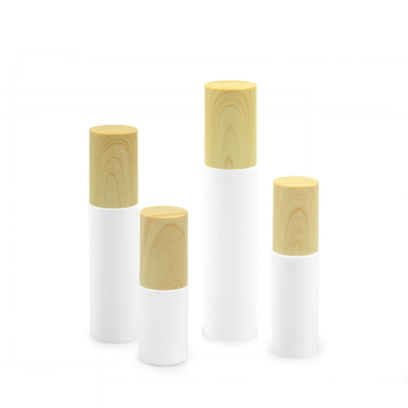 30ml 50ml 100ml whoelsale skincare packaging cylinder face oil fine mist spray bottle with water transfer wooden lid